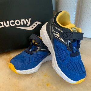 New in box. My sons feet were too large once he started walking. From Stride Rit